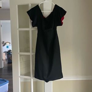 Black cotton and silk dress that falls a bit below the knee